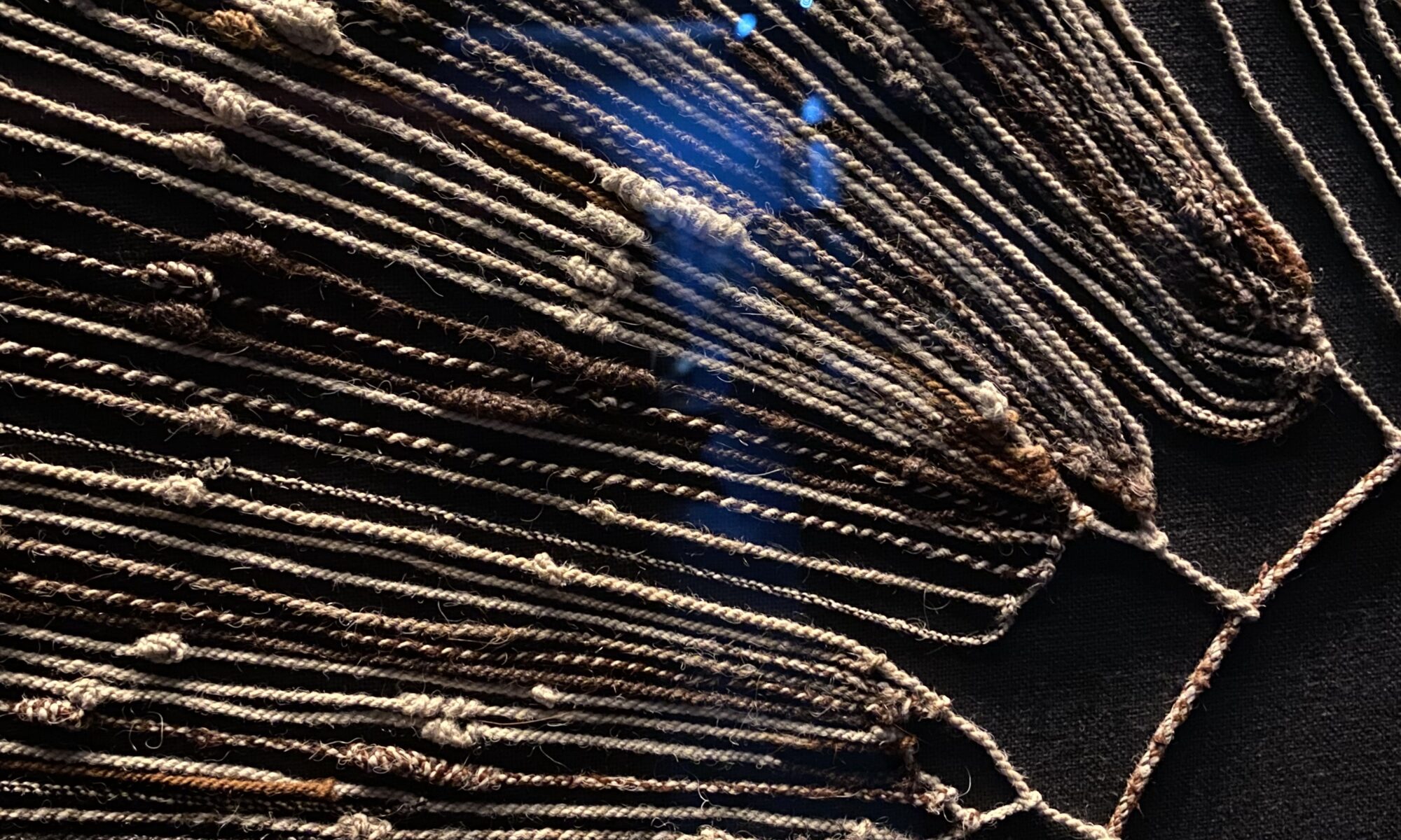Detail from a Quipo in El Museo Chileno de Arte Precolombino. The quipo has 15024 data points